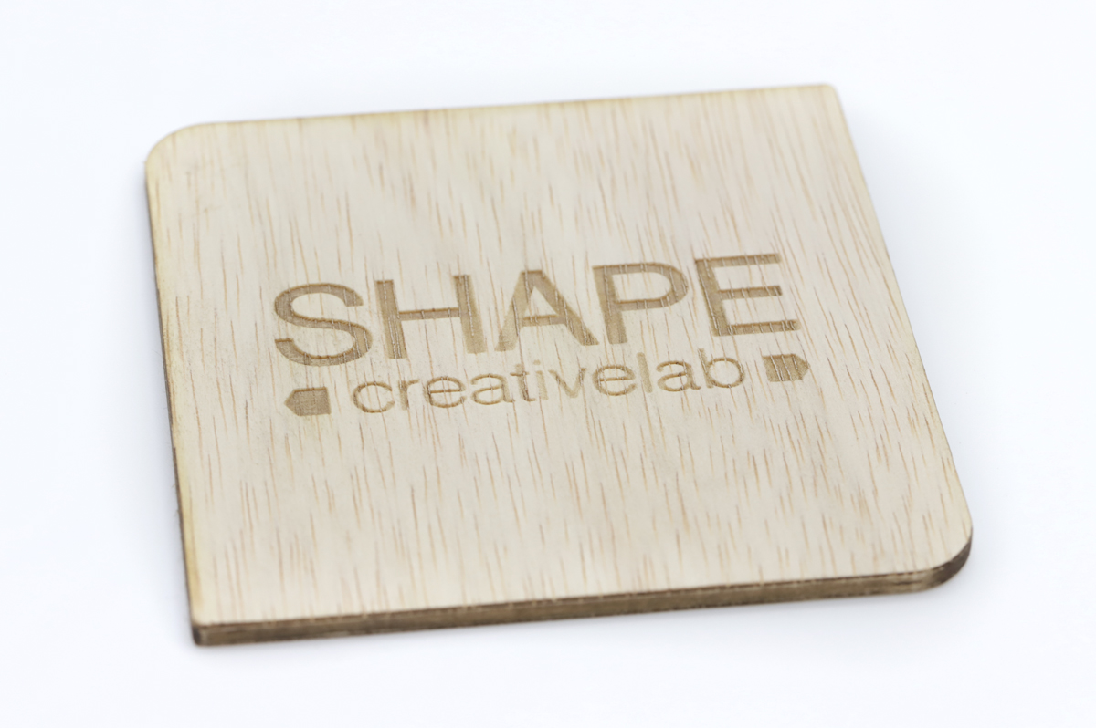 Sotto_bicchiere_in_legno_inciso_14